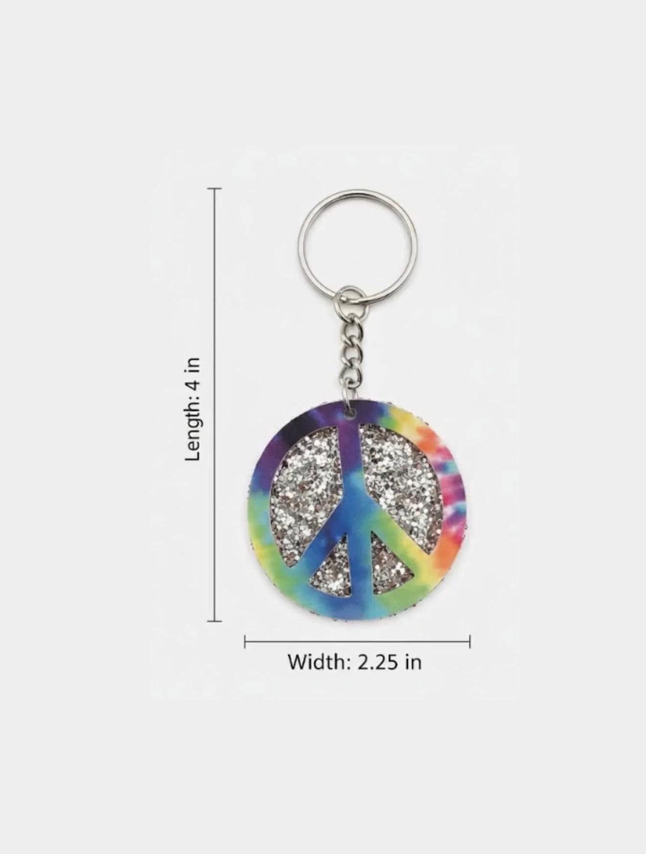 Keychain with peace symbol design and glittery center, shown with measurements on a white background